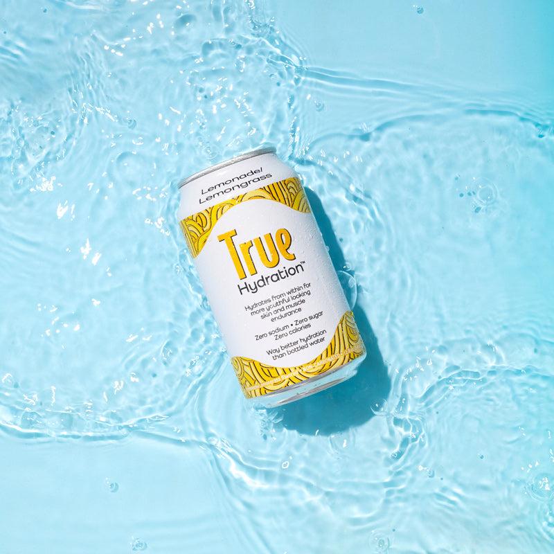 True Hydration Lemonade / Lemongrass in Shallow Water Blue Background